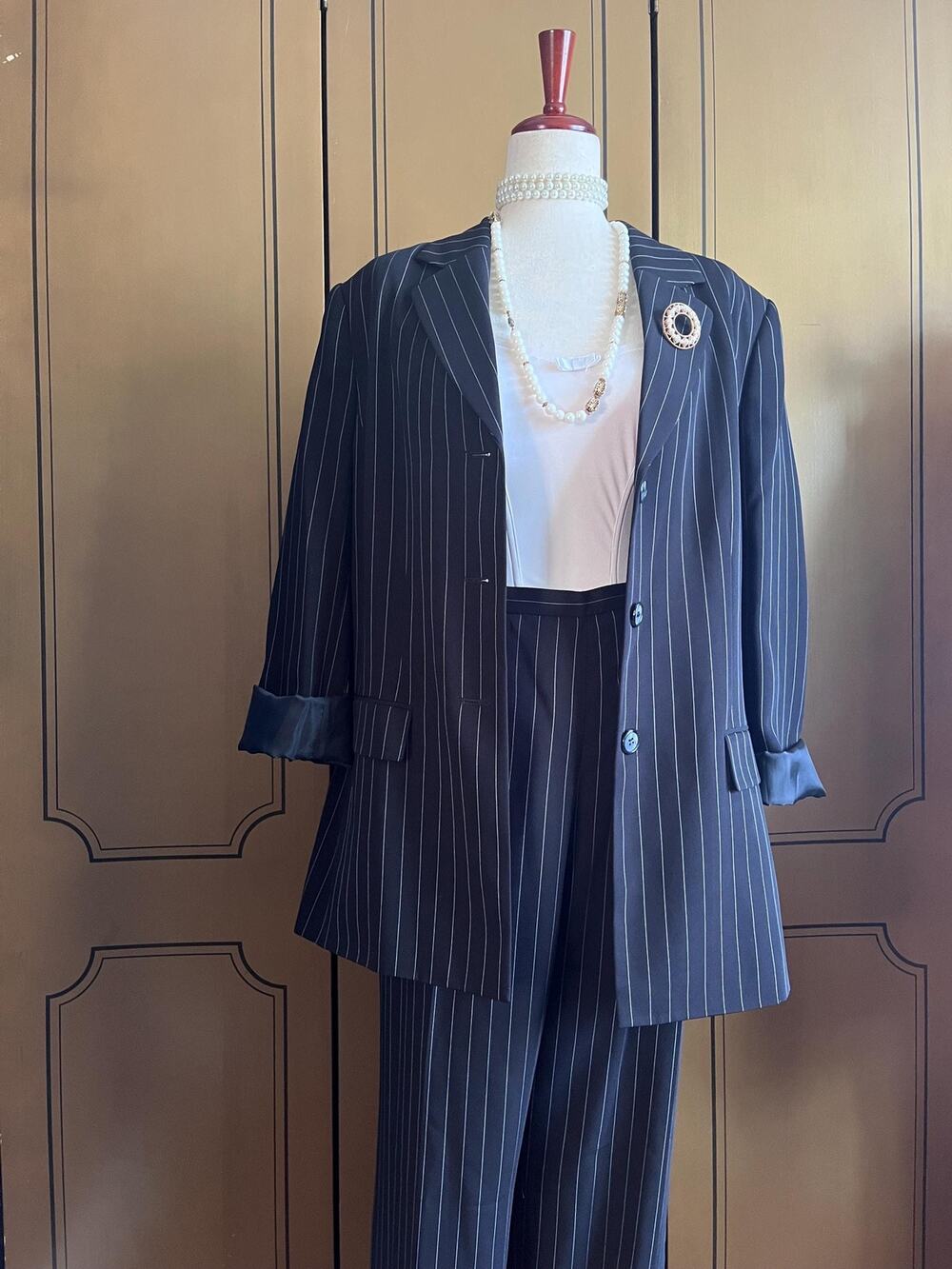 Pinstriped pant suit in black and white, size 18